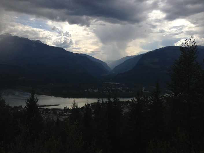 Half way up Mount Revelstoke, facing west.  The Transcanada Hwy #1 meanders through that gap in the mountains. 